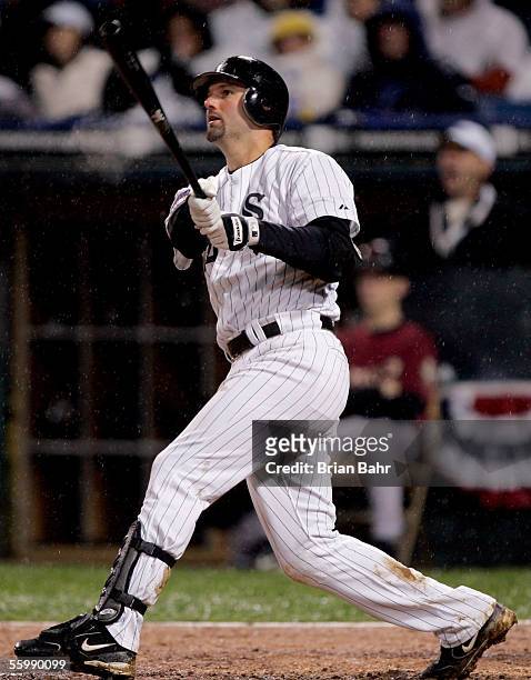 Paul Konerko of the Chicago White Sox watches his grand-slam home run against the Houston Astros in the seventh inning during Game Two of the 2005...