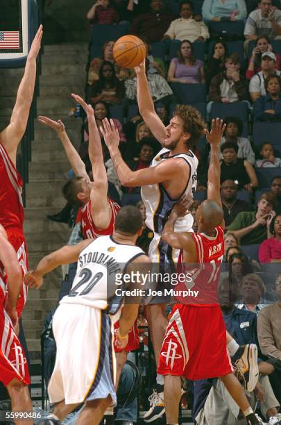 Pau Gasol of the Memphis Grizzlies shoots over Ryan Bowen of the Houston Rockets on October 22, 2005 at Fedex Forum in Memphis, Tennessee. NOTE TO...