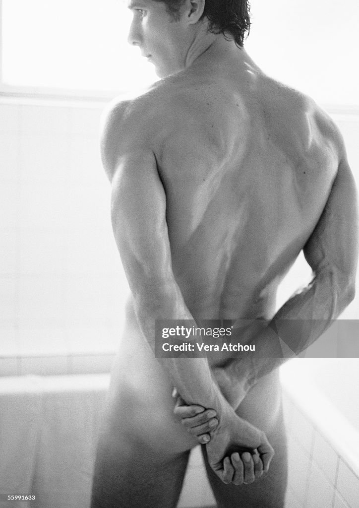 Nude man, rear view, b&w