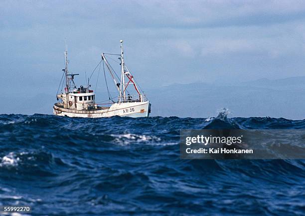 fishing boat at sea - fischerboot stock-fotos und bilder