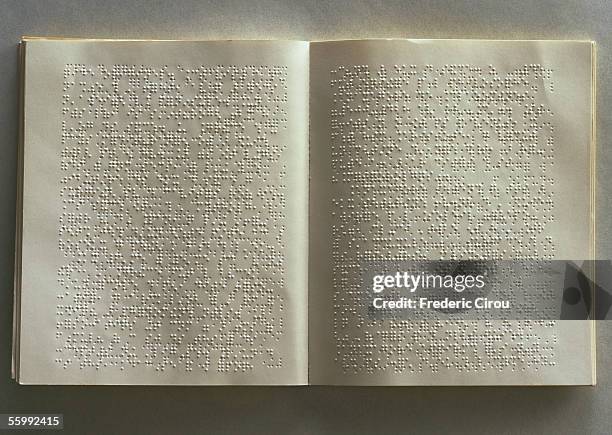 open book with brail on pages - braille stock pictures, royalty-free photos & images