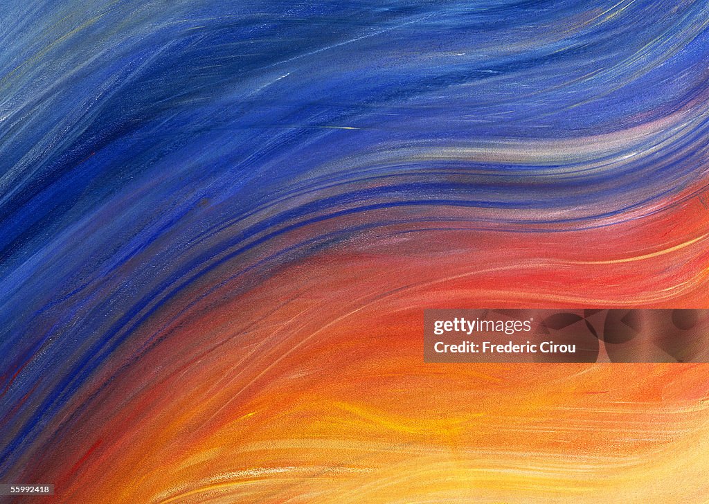 Brush strokes painted in shades of yellow, red and blue, close-up, full frame