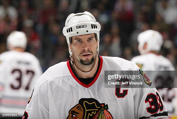 Adrian Aucoin of the Chicago Blackhawks looks on during a break in NHL game action against the Vancouver Canucks at General Motors Place on October...