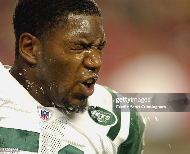 Jonathan Vilma of the New York Jets shakes off sweat during the game against the Atlanta Falcons on October 24, 2005 at the Georgia Dome in Atlanta,...