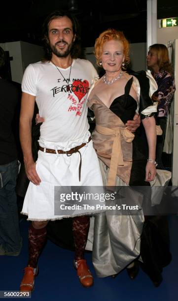 Andreas Kronthaler and partner Vivianne Westwood are seen backstage during the Swarovski Fashion Rocks for The Prince's Trust event at the Grimaldi...