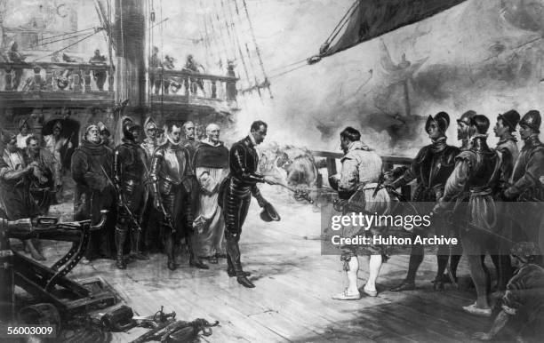 Don Pedro de Valdes, Admiral of the Spanish flagship Nuestra Senora del Rosario, surrenders his sword to Sir Francis Drake of the British navy on...
