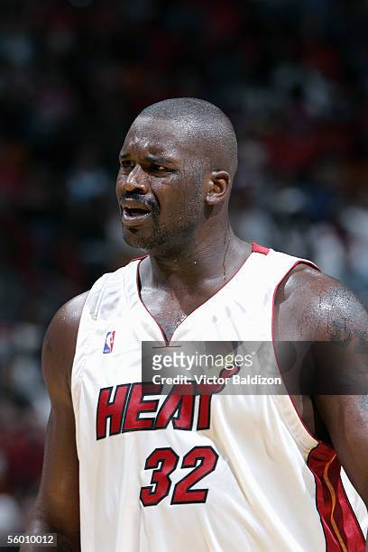 Shaquille O'Neal of the Miami Heat stands on the court during the Hurricane Katrina Relief Benefit Game with the San Antonio Spurs at American...
