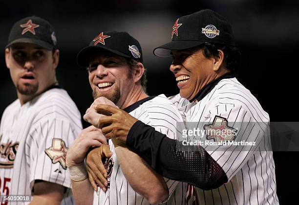 First base coach Jose Cruz of the Houston Astros grabs Jeff Bagwell of the Houston Astros from behind during the team introductions before Game Three...