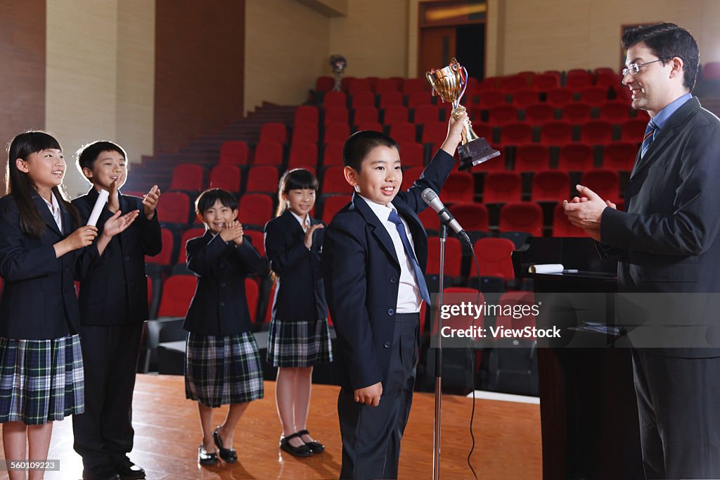 The international primary school teacher was giving pupils Awards