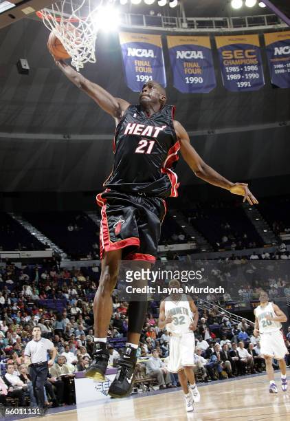 Darius Rice of the Miami Heat gets a breakaway dunk against the New Orleans/Oklahoma City Hornets during a preseason game on October 25, 2005 at the...