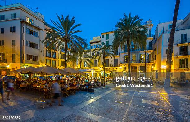 spain, mallorca, palma de mallorca, restaurants at paseo sagrera by night - town square night stock pictures, royalty-free photos & images