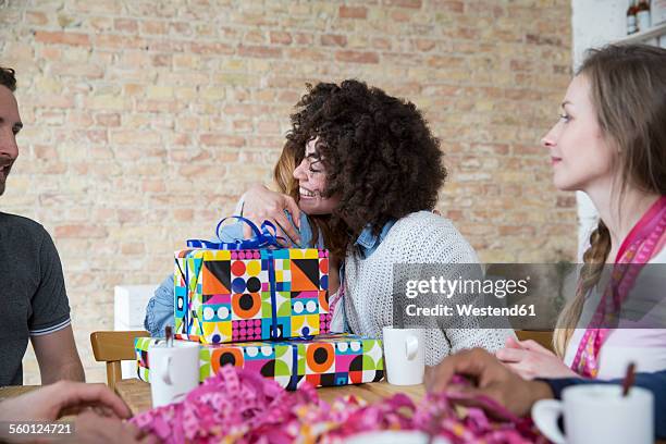 group of friends celebrating birthday - gift lounge stock pictures, royalty-free photos & images