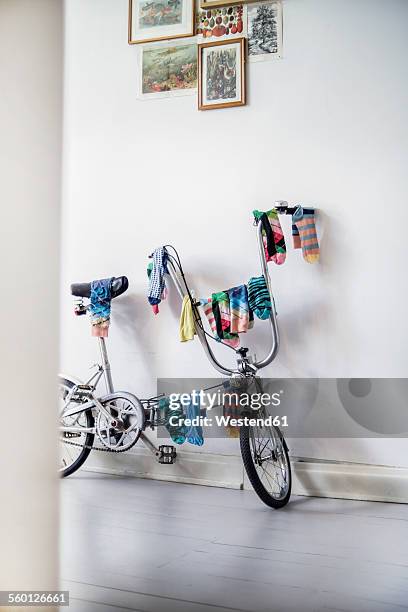 bicycle used as clotheshorse - odd socks stock pictures, royalty-free photos & images