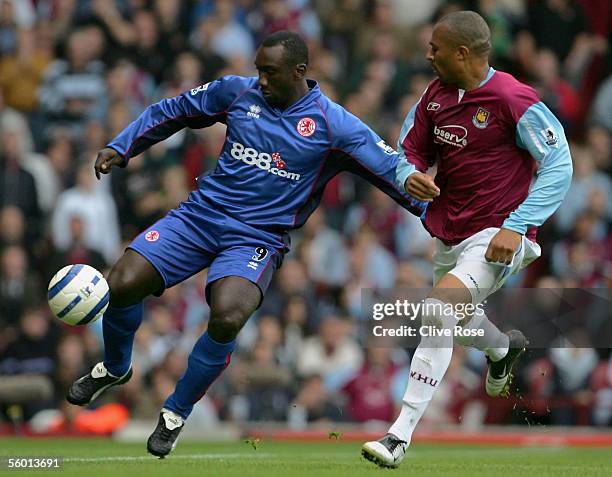 Jimmy Floyd Hasselbaink of Middlesbrough holds off Danny Gabbidon of West Ham United during the FA Barclays Premiership match between West Ham United...