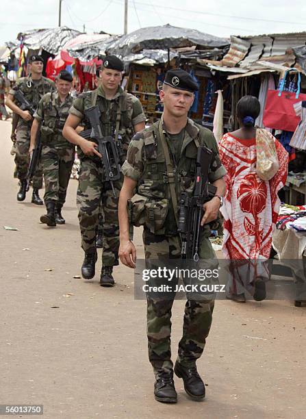 French soldiers from the Licorne forces patrol the village of Danane, 70kms west of Man and 30kms of the border with the Liberia 26 October 2005....