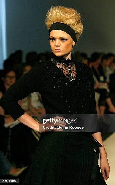 Model walks down the catwalk during the Charlie Brown Fashion Parade on day one of the Mercedes Australian Fashion Week at Federation Square on...