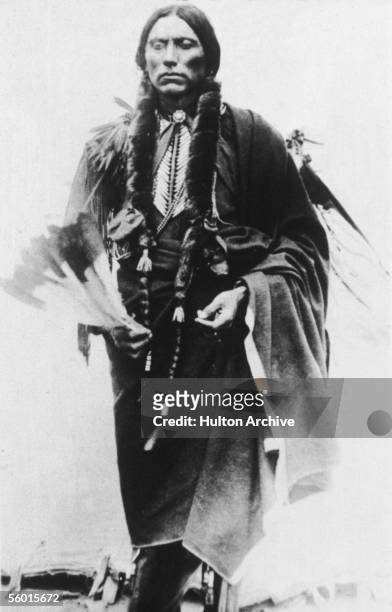 Last great chief of the North American Comanche indian tribe Quanah Parker stands and poses for a photograph, late 19th Century. Parker, the son of...