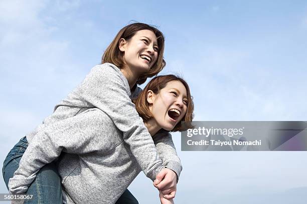 290 Identical Asian Twins Stock Photos, High-Res Pictures, and