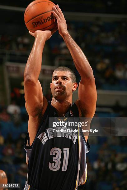 Shane Battier of the Memphis Grizzlies with the ball during the preseason game against the Cleveland Cavaliers at Gund Arena on October 19, 2005 in...