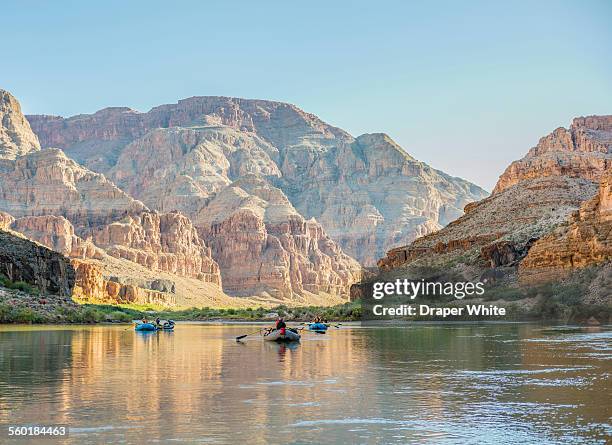 rafters floating down the grand canyon. - grand canyon stock-fotos und bilder