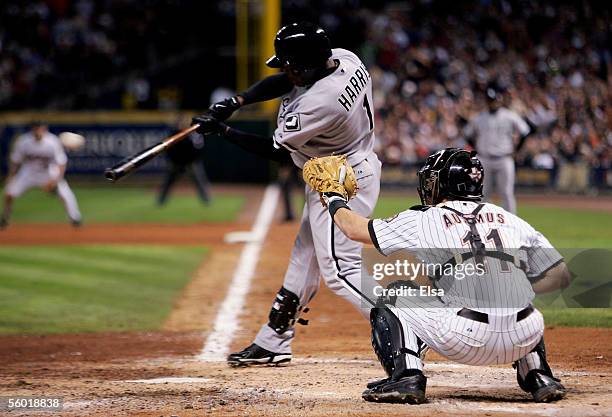 Willie Harris of the Chicago White Sox hits a single in the eighth inning against the Houston Astros during Game Four of the Major League Baseball...