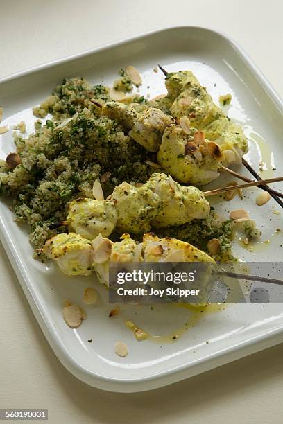 monkfish kebabs with quinoa tabbouleh - almond joy stock pictures, royalty-free photos & images