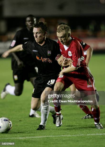 Ben Bodwitch of Barnet and Dave Cotterill of Bristol City battle for the ball during the NLDV Vans Trophy match between Barnet and Bristol City at...