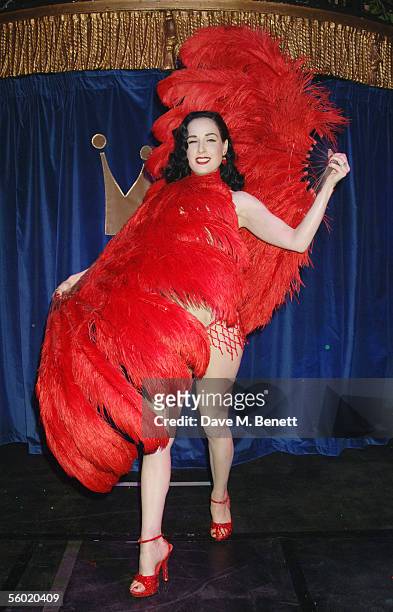 Burlesque artist Dita Von Teese performs on stage at Cafe De Paris' 80th birthday on October 27, 2005 in London, England.