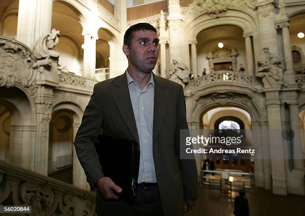 Defendant, professional soccer player Steffen Karl, arrives at fourth day of the district court hearing regarding the football betting scandal, on...