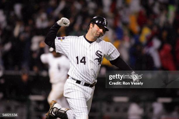 Paul Konerko of the Chicago White Sox reacts after hitting a grand slam home run in the bottom of the seventh inning during Game 2 of the 2005 World...