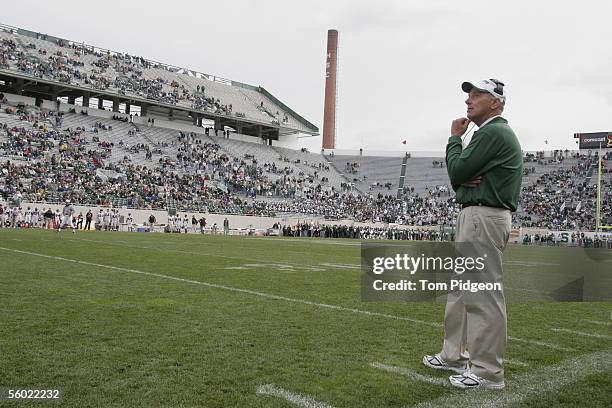 Head coach John L. Smith of the Michigan State Spartans looks on against the Northwestern Wildcats at Spartan Stadium on October 22, 2005 in East...