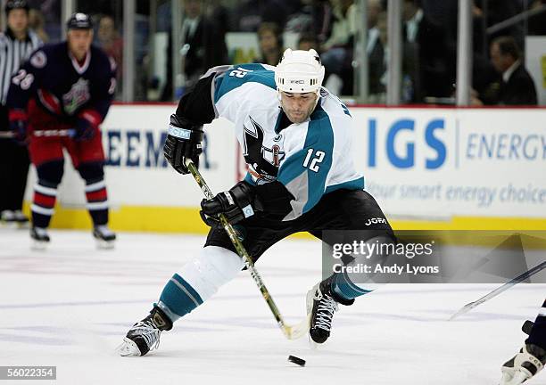 Patrick Marleau of the San Jose Sharks skates the puck through the neutral zone against the Columbus Blue Jackets during their NHL game at Nationwide...