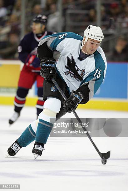 Wayne Primeau of the San Jose Sharks skates the puck through center ice against the Columbus Blue Jackets during their NHL game at Nationwide Arena...