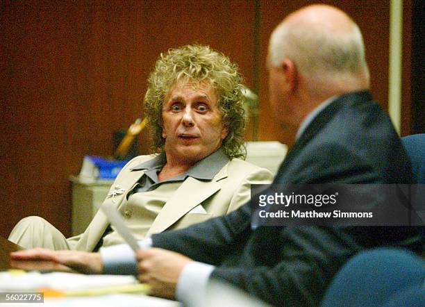 Music Producer Phil Spector speaks with his attorney Bruce Cutler at a Pre-Trial Conference at the Los Angeles Superior Court on October 27, 2005 in...