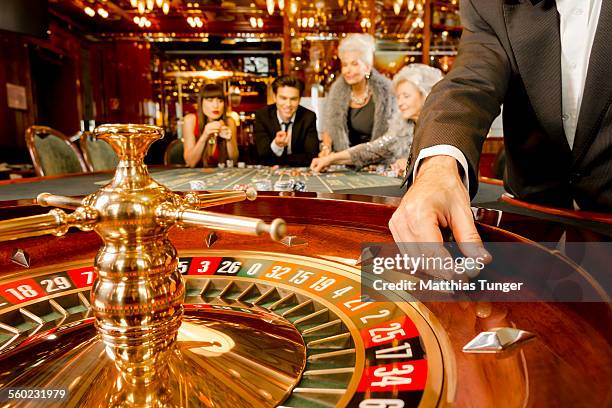 game of luck in a casino - roulette stockfoto's en -beelden