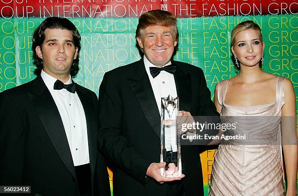 Donald Trump, Visionary Business Leader award honoree, poses with his children Donald Trump Jr. And Ivanka at Fashion Group International's 22nd...