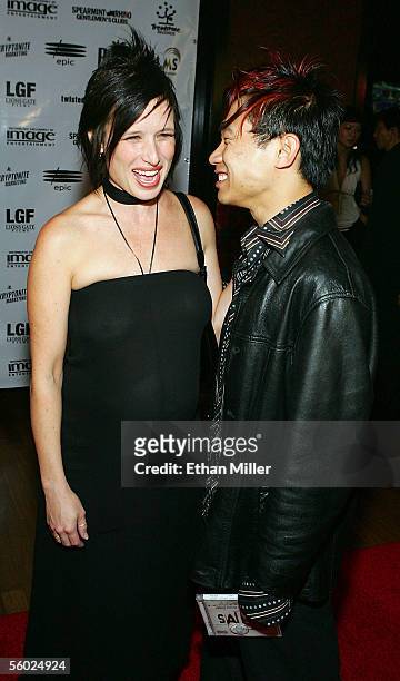 Actress Shawnee Smith and director/writer James Wan arrive at the soundtrack release party for "Saw II" after attending a special screening of the...