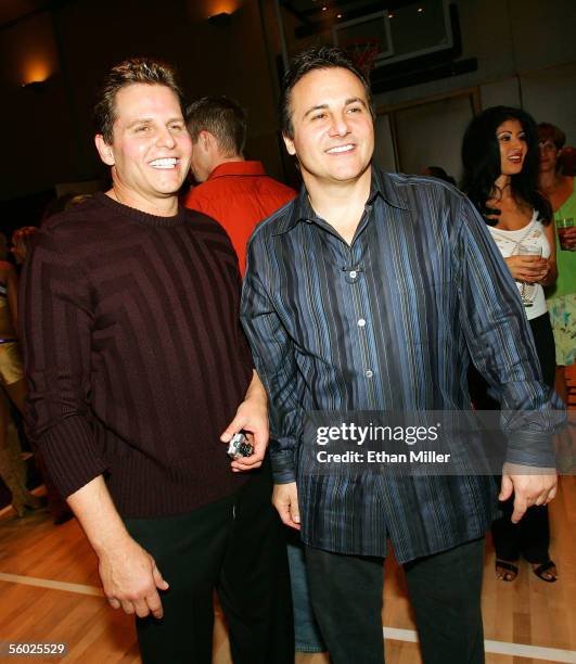 Two of the owners of the NBA's Sacramento Kings team Joe Maloof and his brother Gavin Maloof pose during a party held to introduce the Hardwood Suite...