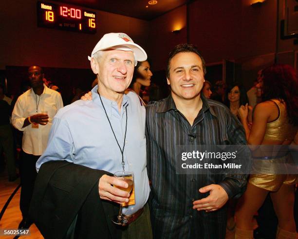 Former Arizona State University basketball coach Bill Frieder and one of the owners of the NBA's Sacramento Kings team Gavin Maloof pose during a...