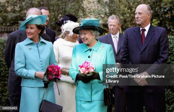 Queen Sonja of Norway, Queen Elizabeth II and King Harald of Norway attend the unveiling of a statue of the late Queen Maud of Norway at the...
