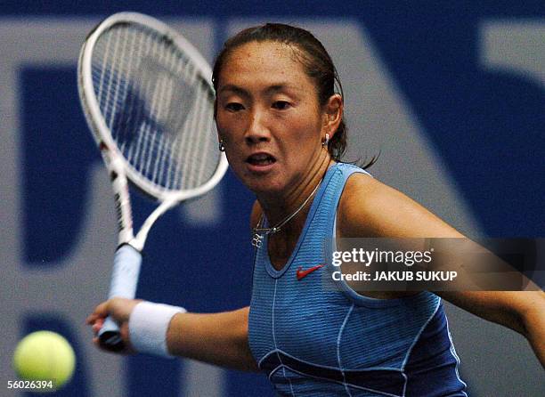 Ai Sugiyama from Japan receives a service from Germany's Kveta Peschke during their WTA quarterfinal match in Linz, Austria, 28 October 2005. AFP...