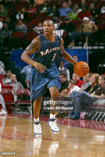 Caron Butler of the Washington Wizards brings the ball upcourt during the preseason game against the Houston Rockets at Toyota Center on October 23,...