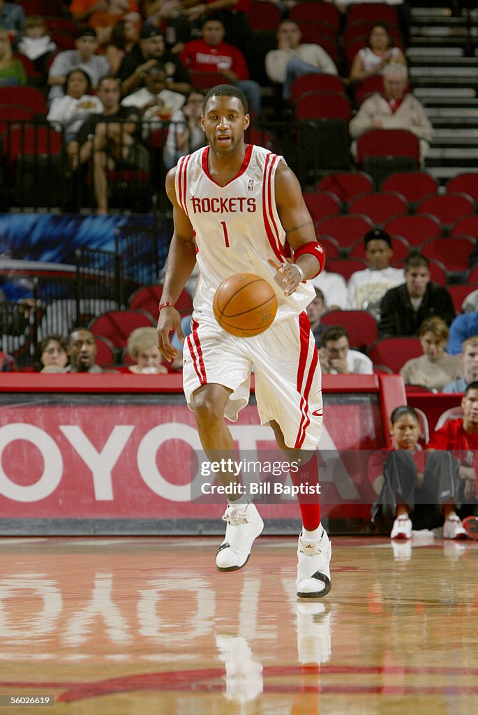 T Mac Rockets Tracy McGrady of the Houston Rockets brings the ball upcourt during ...