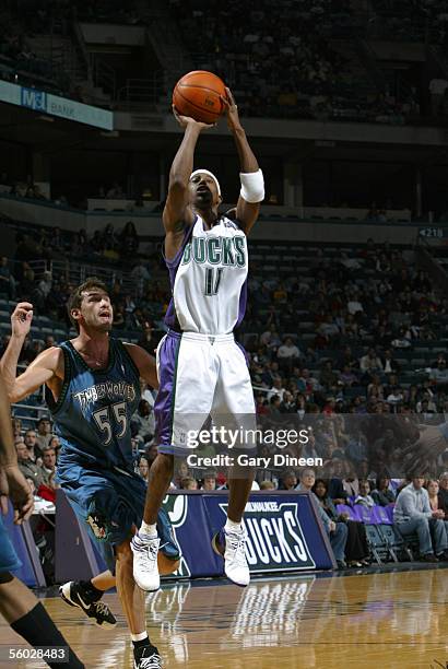 Ford of the Milwaukee Bucks attempts a shot against Marko Jaric of the Minnesota Timberwolves during a NBA preseason game October 22, 2005 at the...