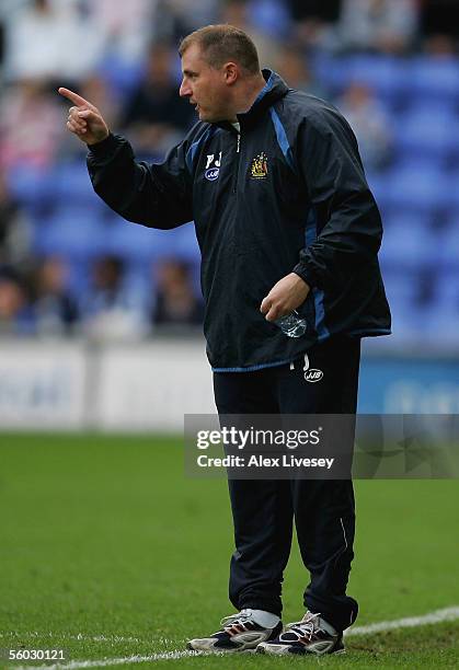 Paul Jewell, manager of Wigan Athletic, gives instructions to his players during the Barclays Premiership match between Wigan Athletic and Fulham at...