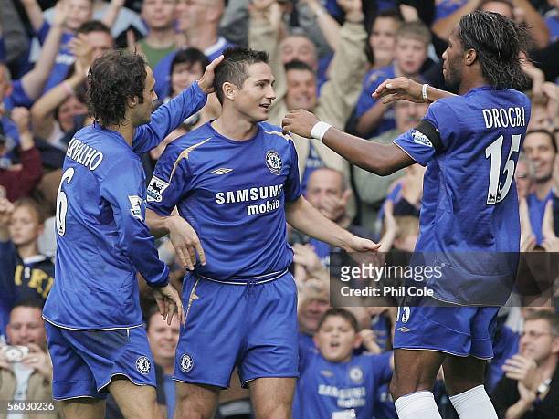 Goal scorer Frank Lampard of Chelsea celebrates with team mates Didier Drogba and Ricardo Carvalho during the FA Barclays Premiership match between...