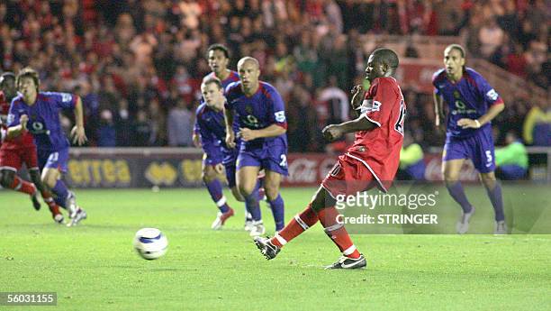 Middlesborough, UNITED KINGDOM: Middlesbrough's Yakubu scores the third goal from a penalty spot against Manchester United Manchester during the...