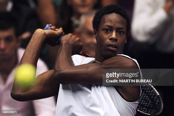 French tennis player Gael Monfils hits a return to US opponent Andy Roddick during the final match of the Lyon tennis Grand Prix, 30 October 2005 in...