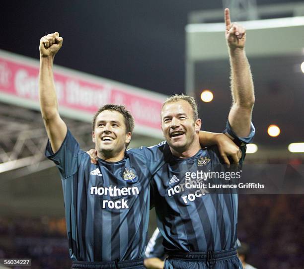 Alan Shearer of Newcastle United is congratulated on his goal by Michael Owen during the Barclays Premiership match between West Bromwich Albion and...