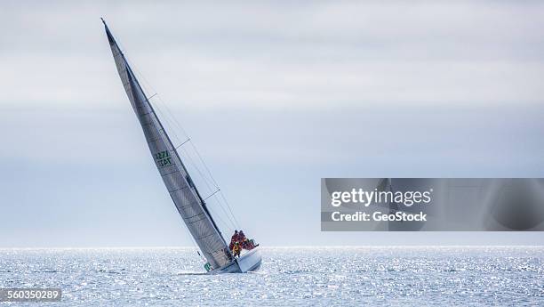 a sailboat on the salish sea - yachting race stock pictures, royalty-free photos & images